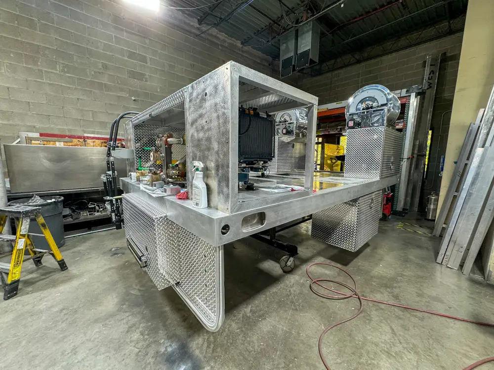 Side view of apparatus during shop assembly, photo 172 of 303.